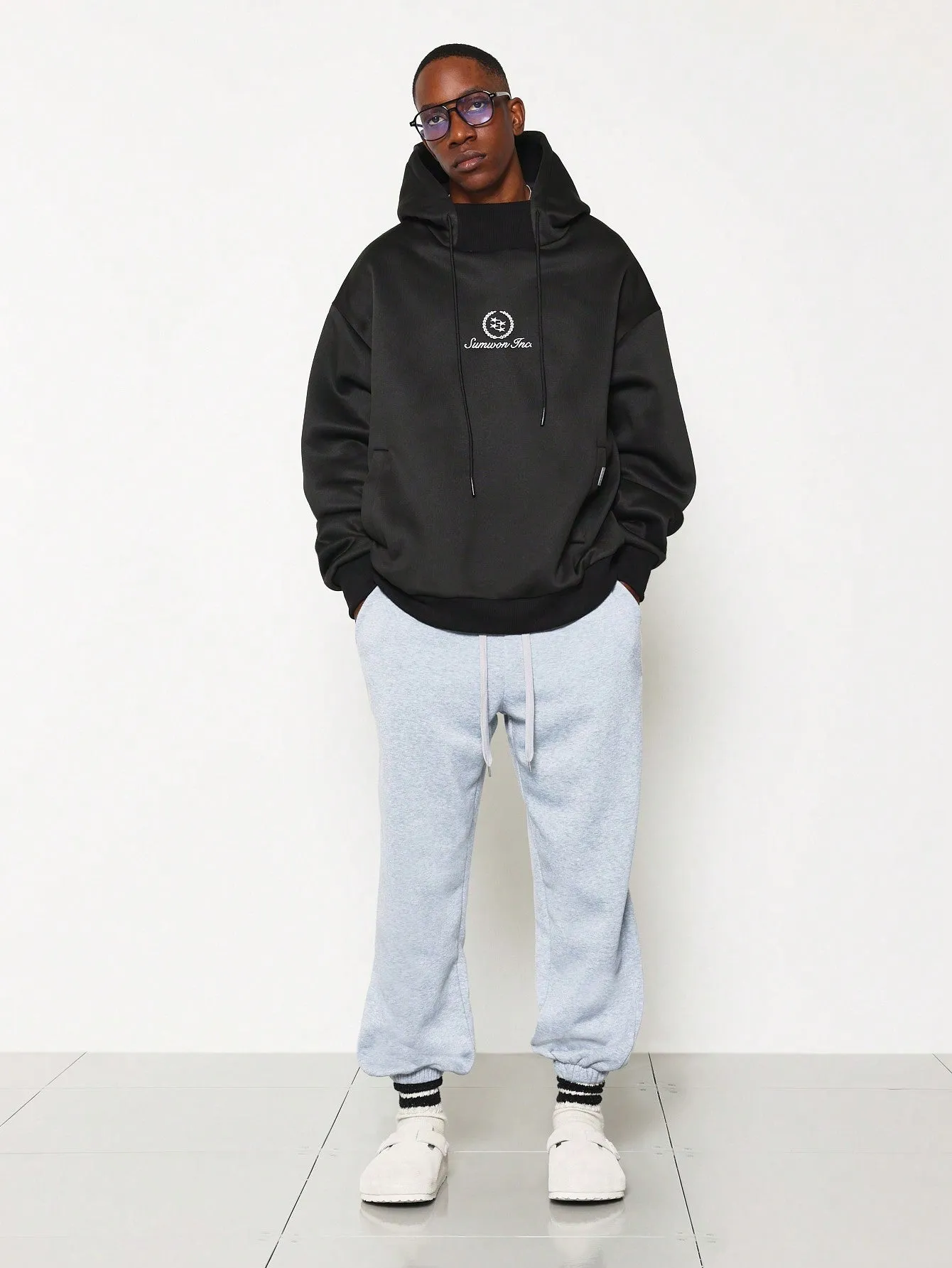 Oversized Side Pocket Hoodie With Layered Neck Rib & Embroidery